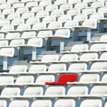 one red chair in tribune